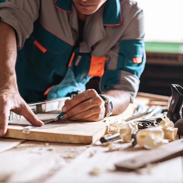 Carpenter creating a new kitchen